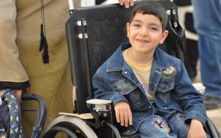 Kid in wheelchair
